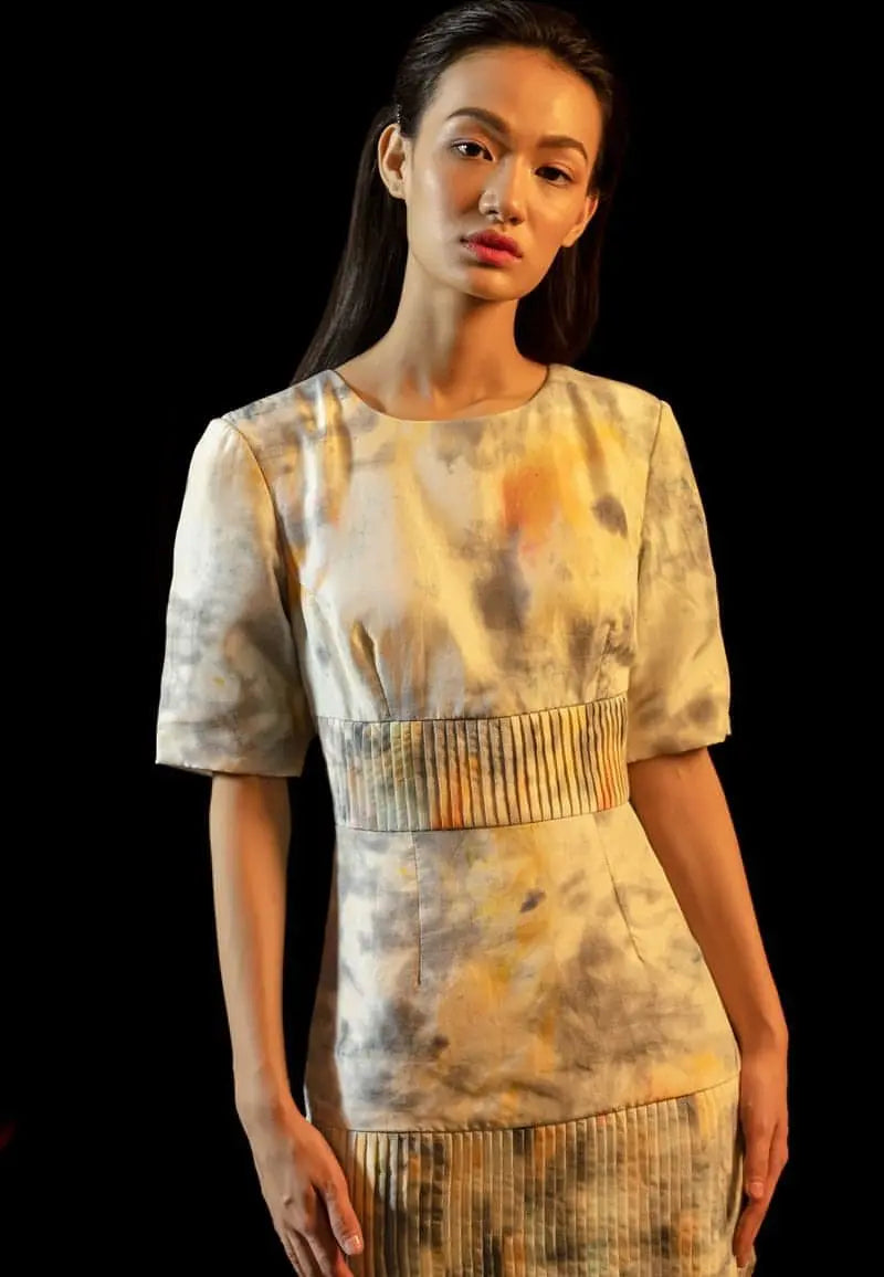 Womens mini dress collection, this half-sleeved mini dress is made from luxe tie-dye silk in grey and yellow. The shoulder pads give it a structured and strong look. Take this versatile piece from day to night or from summer to winter in seconds. Pair it with heeled sandals or flats and minimal gold jewelry to complete the look.