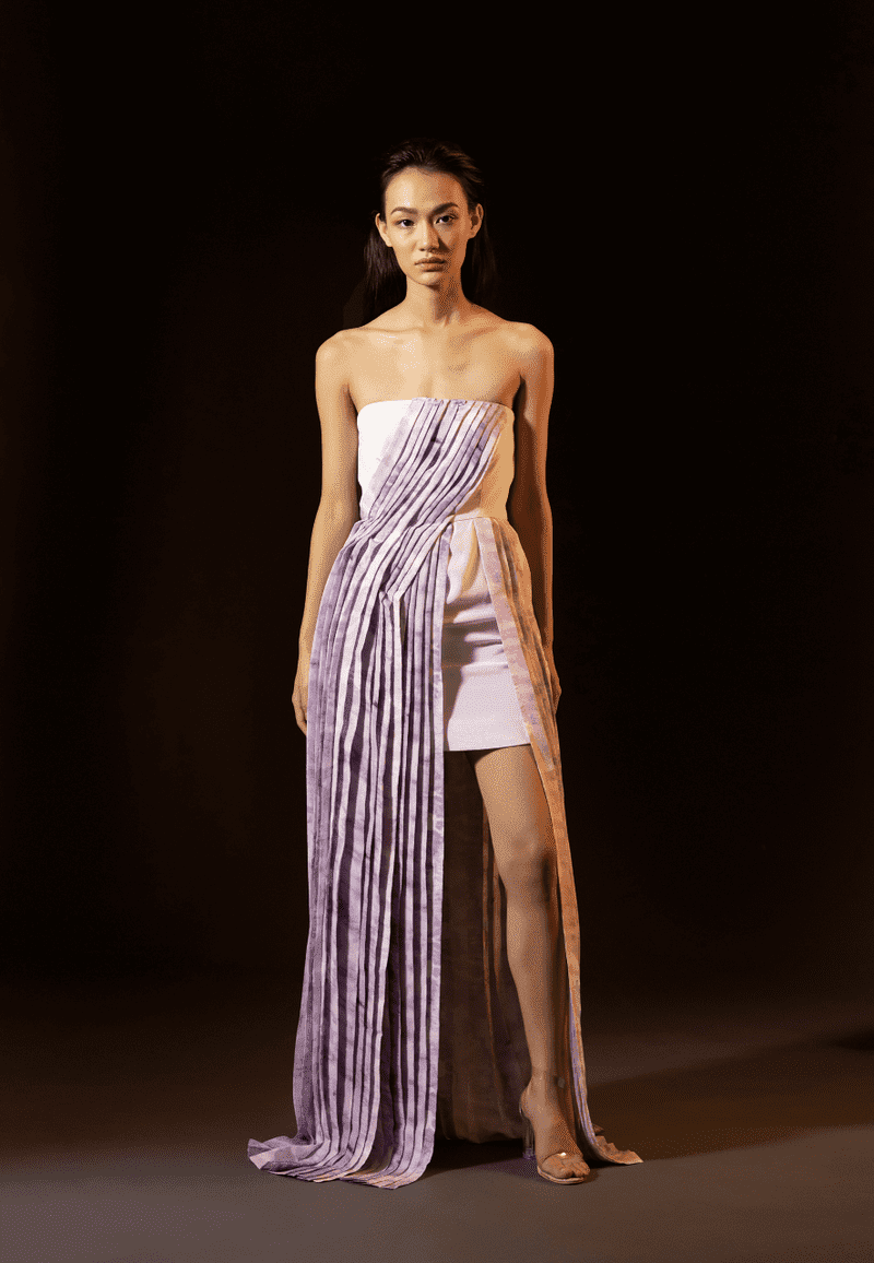 Womens bandeau asymmetrical pleated dress made using pure silk crepe. The purple tie dye fabric is draped and hand pleated over the white bodice to give it an unconventional look. This is perfect summer dress for beach parties and dinners.