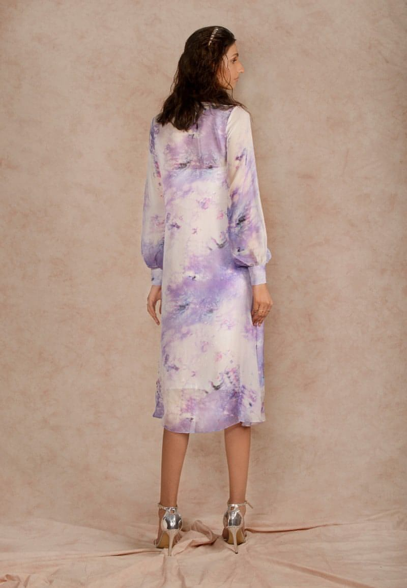 This purple and white sheer dye print midi dress with a  sequin dress underneath can be styled in multiple ways. Made in chiffon and crepe this ensemble with handcrafted bandeau is perfect for the next date or formal evenings. Wear the piece in summer or style it in winter with an overlap jacket and stylish boots